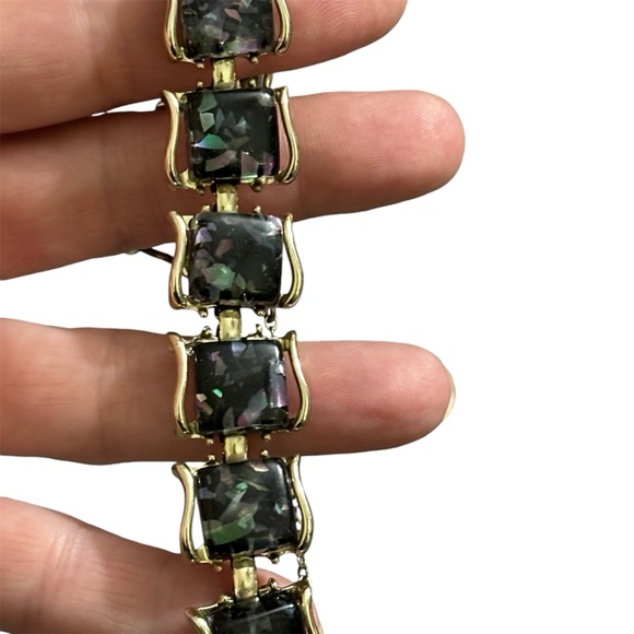 Vintage signed Pegasus CORO black metallic confetti lucite gold toned bracelet. - Picture 2 of 7
